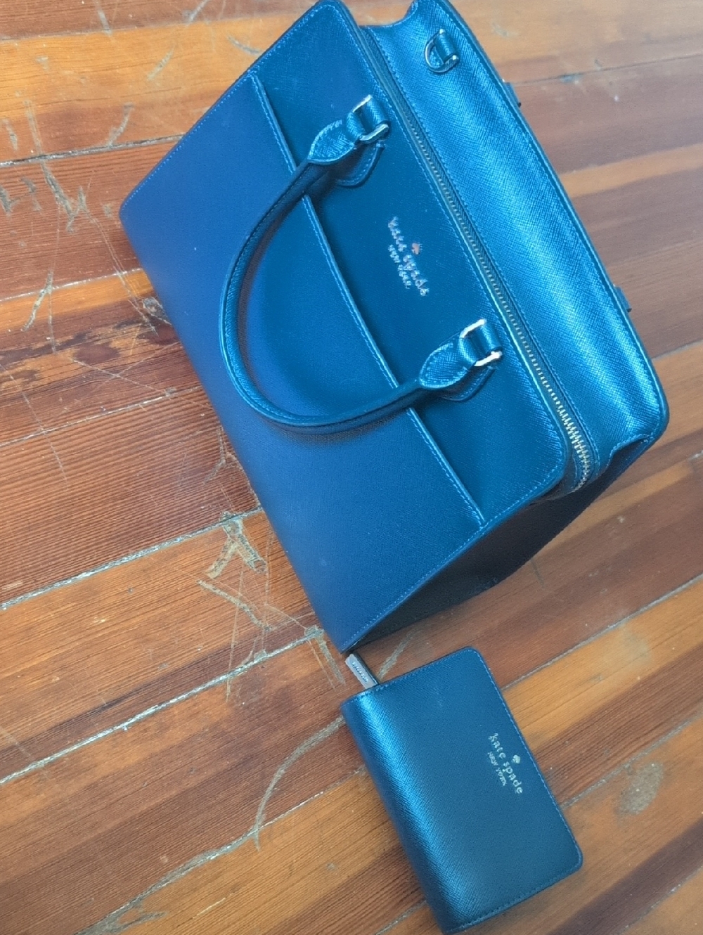 kate spade navy leather satchel and matching navy wallet!